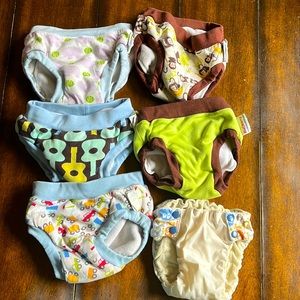 Lot of 6 training pants, medium. Blueberry and Trimsies.